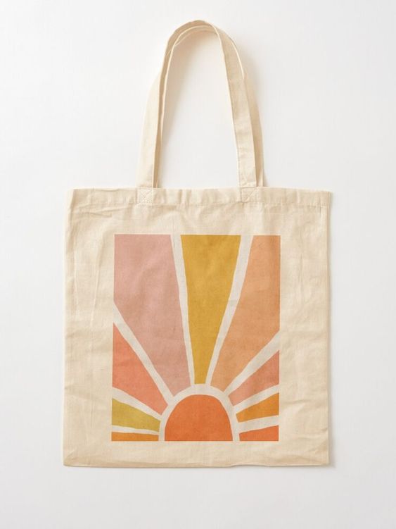 Tote bag con diseño sencillo pintado a mano en tres colores (amarillo rosa y naranja)  con tela de loneta cruda.